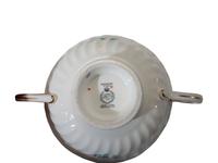 A Minton Porcelain Dinner Service