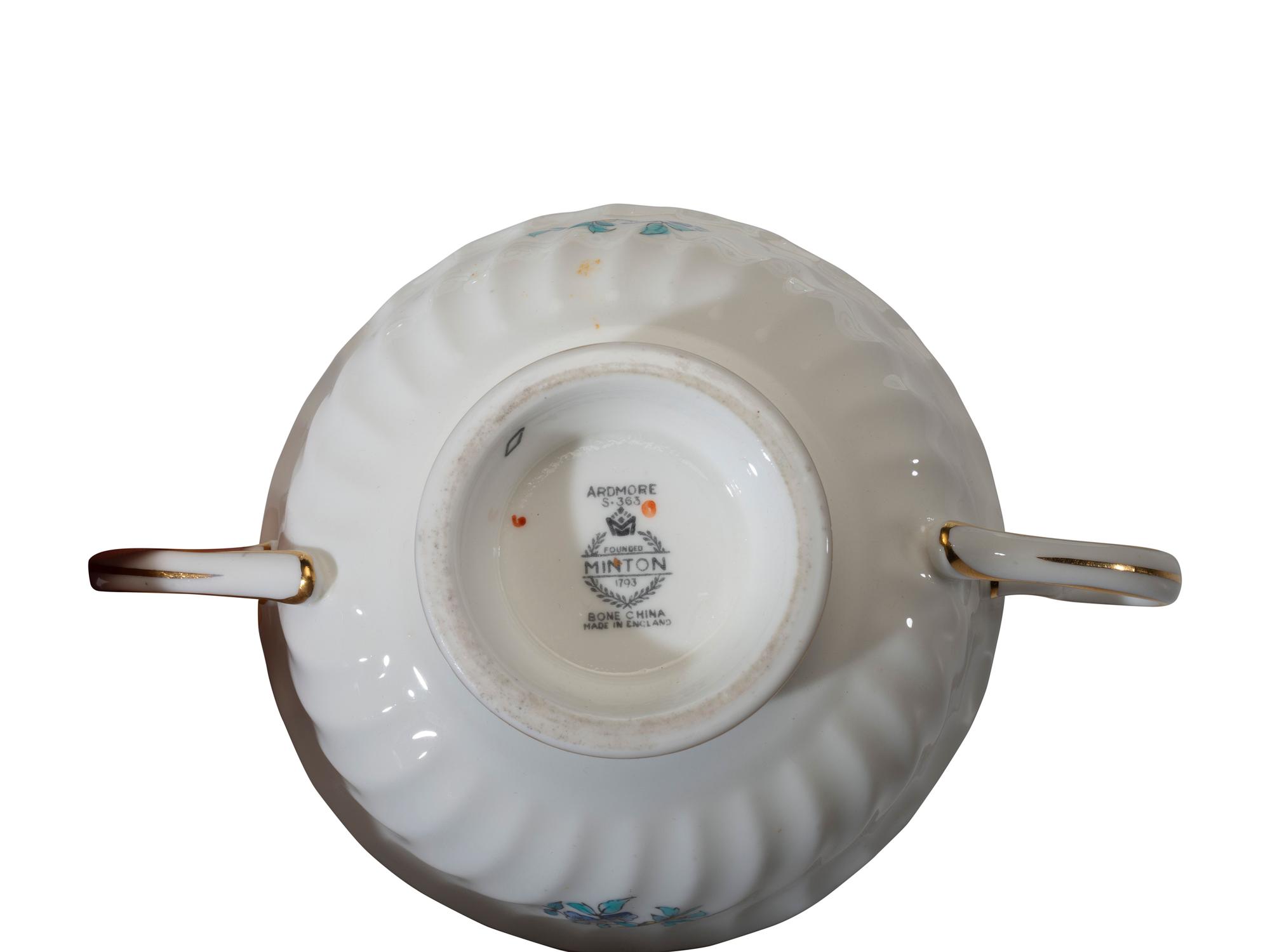 A Minton Porcelain Dinner Service