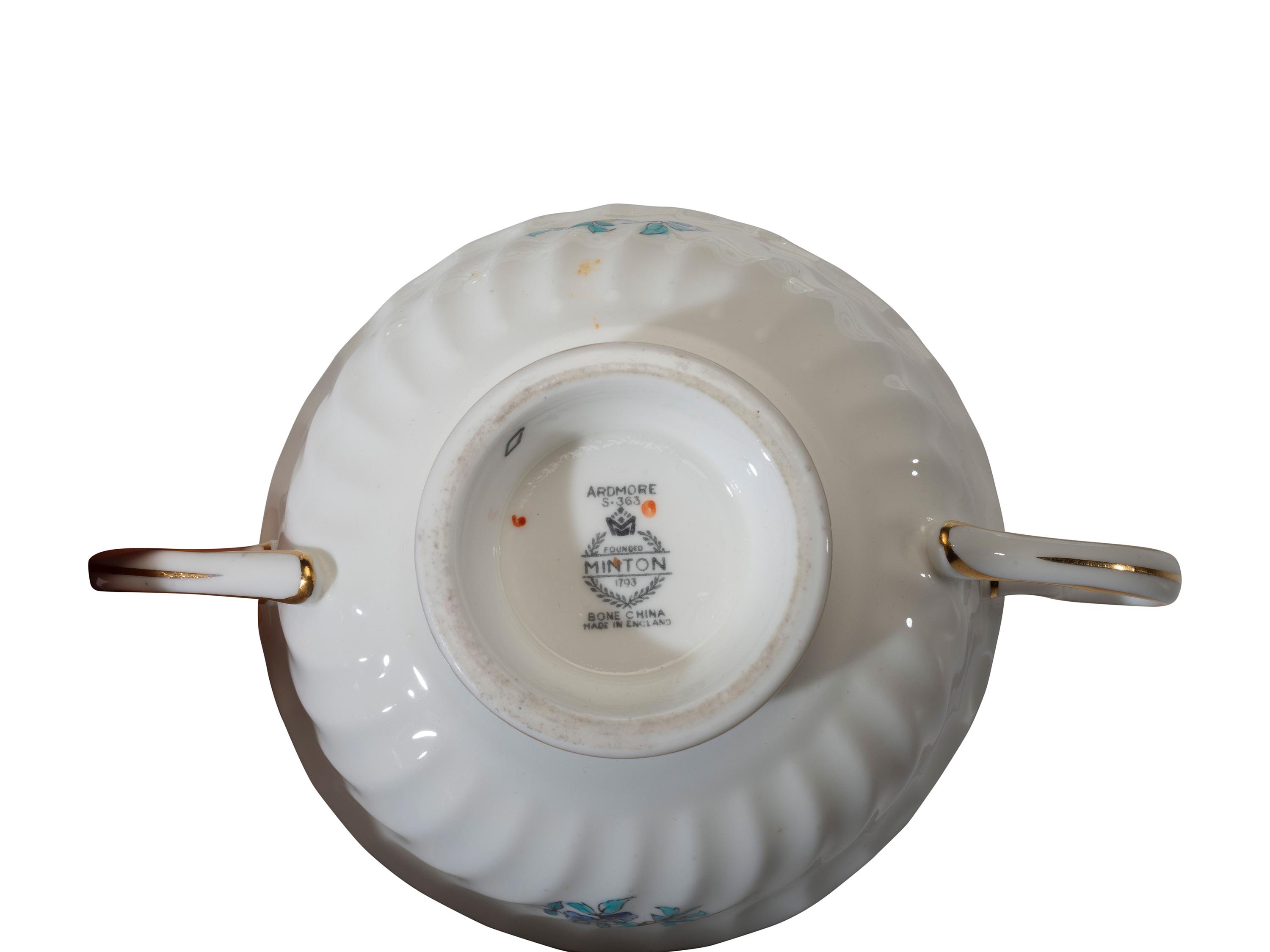 A Minton Porcelain Dinner Service