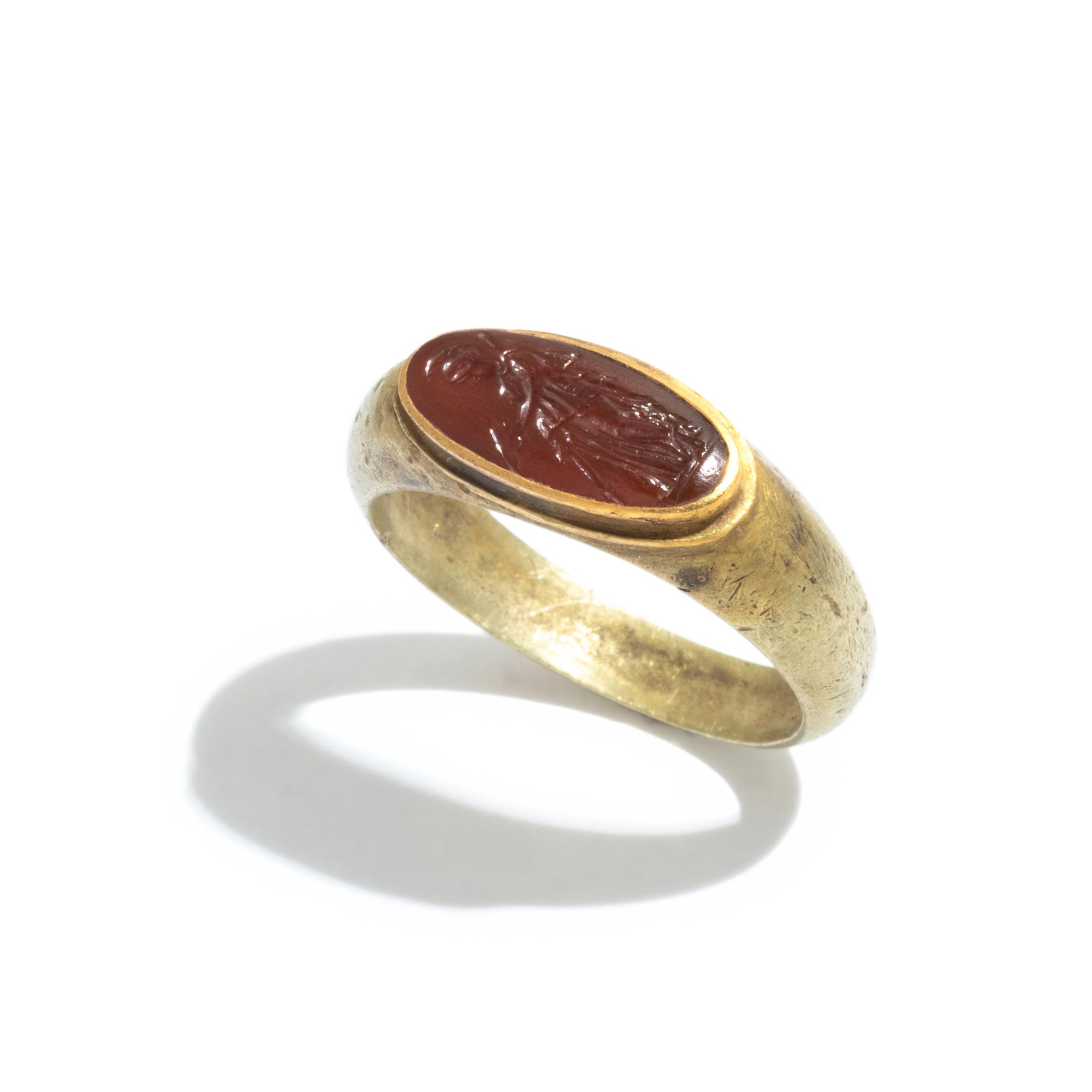 A Roman Gold and Carnelian Finger Ring with the Goddess Minerva