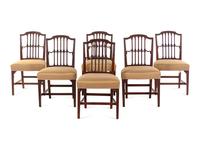A Set of Six Regency Carved Mahogany Dining Chairs