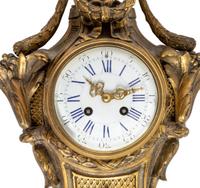 A Louis XVI Style Gilt Bronze Cartel Clock