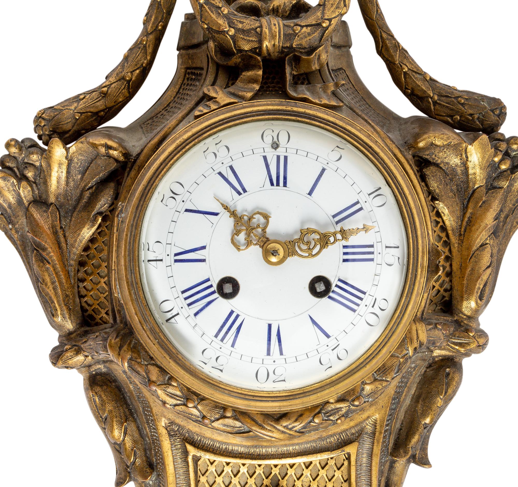 A Louis XVI Style Gilt Bronze Cartel Clock