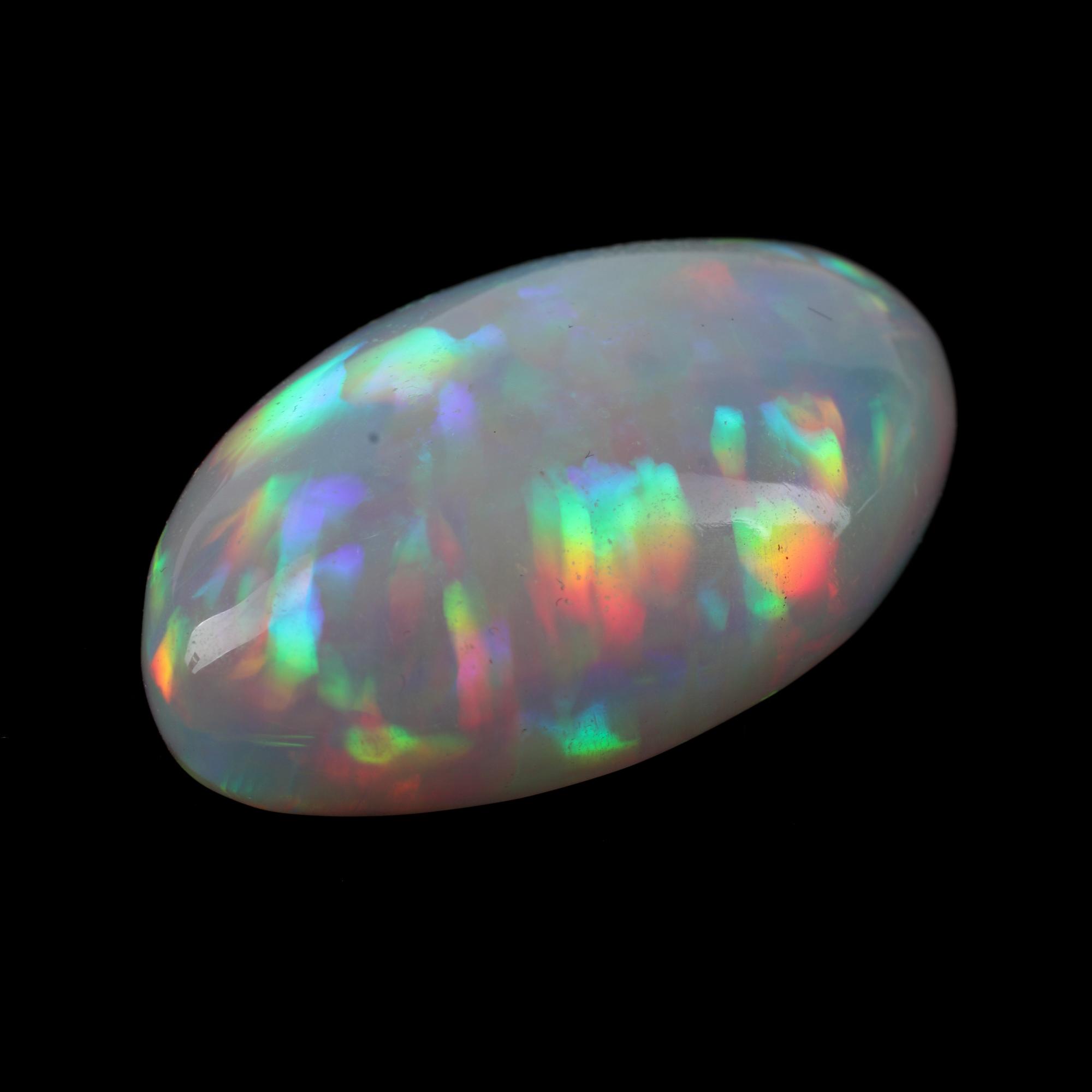 A Large Unmounted Oval-Shaped Opal Cabochon