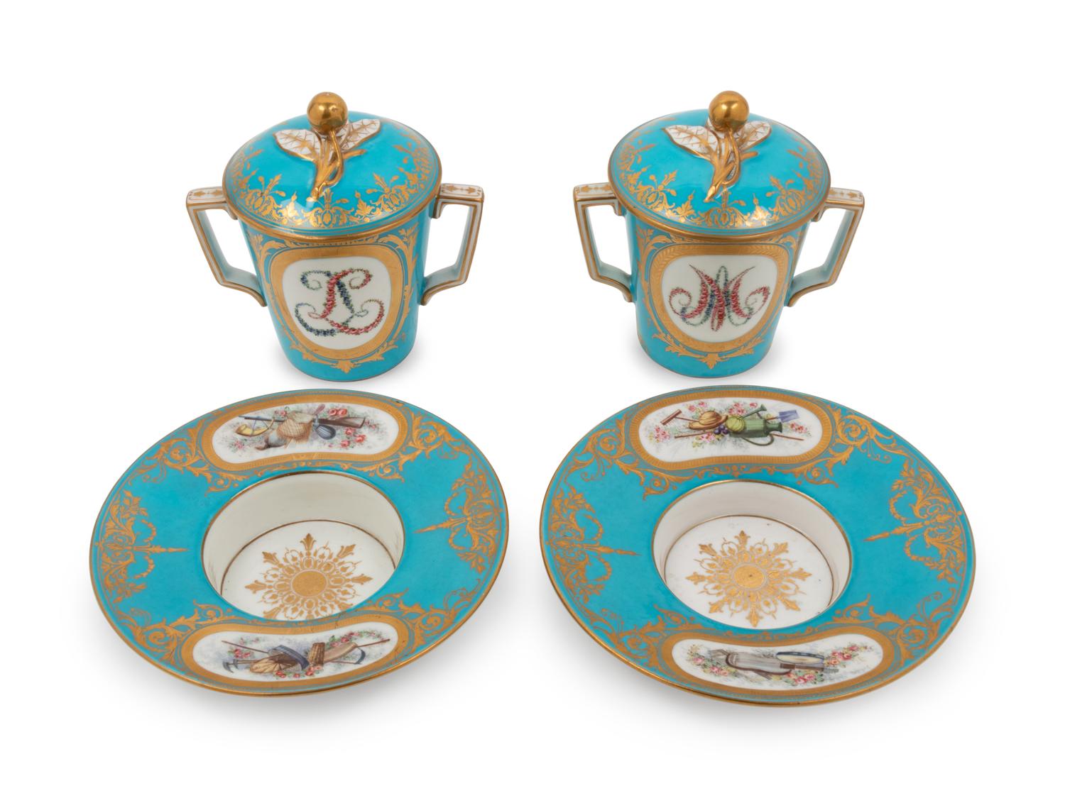 A Pair of Sèvres Style Porcelain Cups and Saucers
