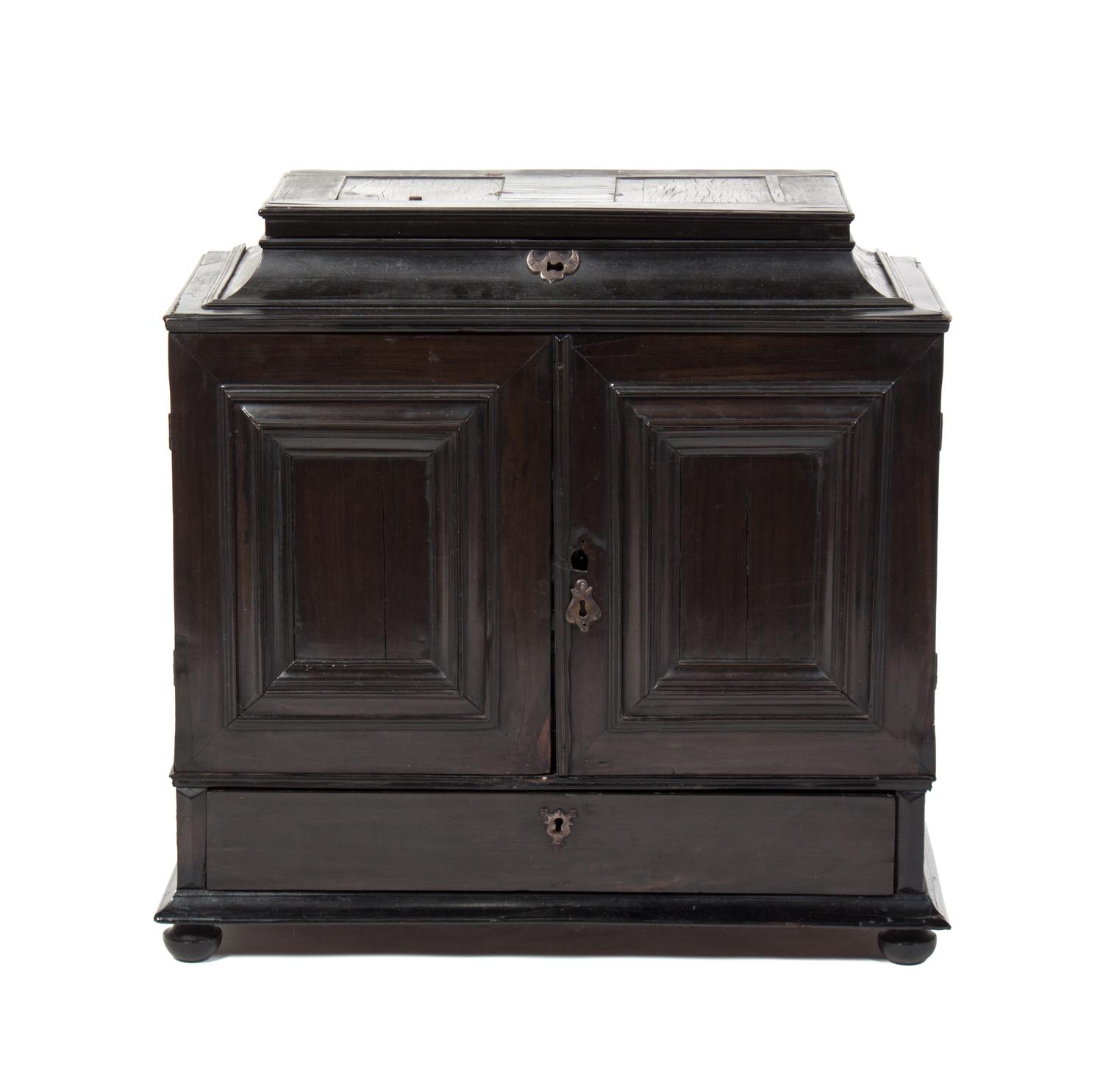 An Italian Ebony and Tortoise Shell Collector's Cabinet Height 23 1/2 x width 24 x depth 12 inches.