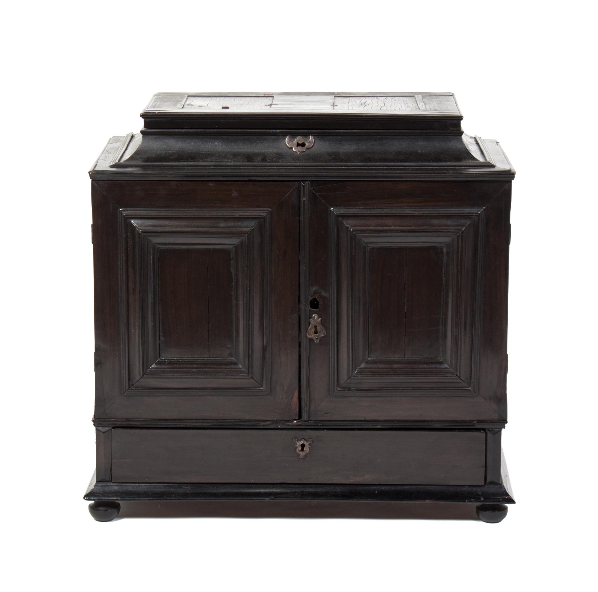 An Italian Ebony and Tortoise Shell Collector's Cabinet Height 23 1/2 x width 24 x depth 12 inches.