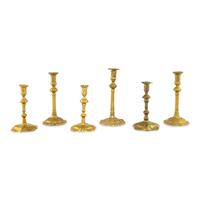 A Collection of Six Brass Candlesticks