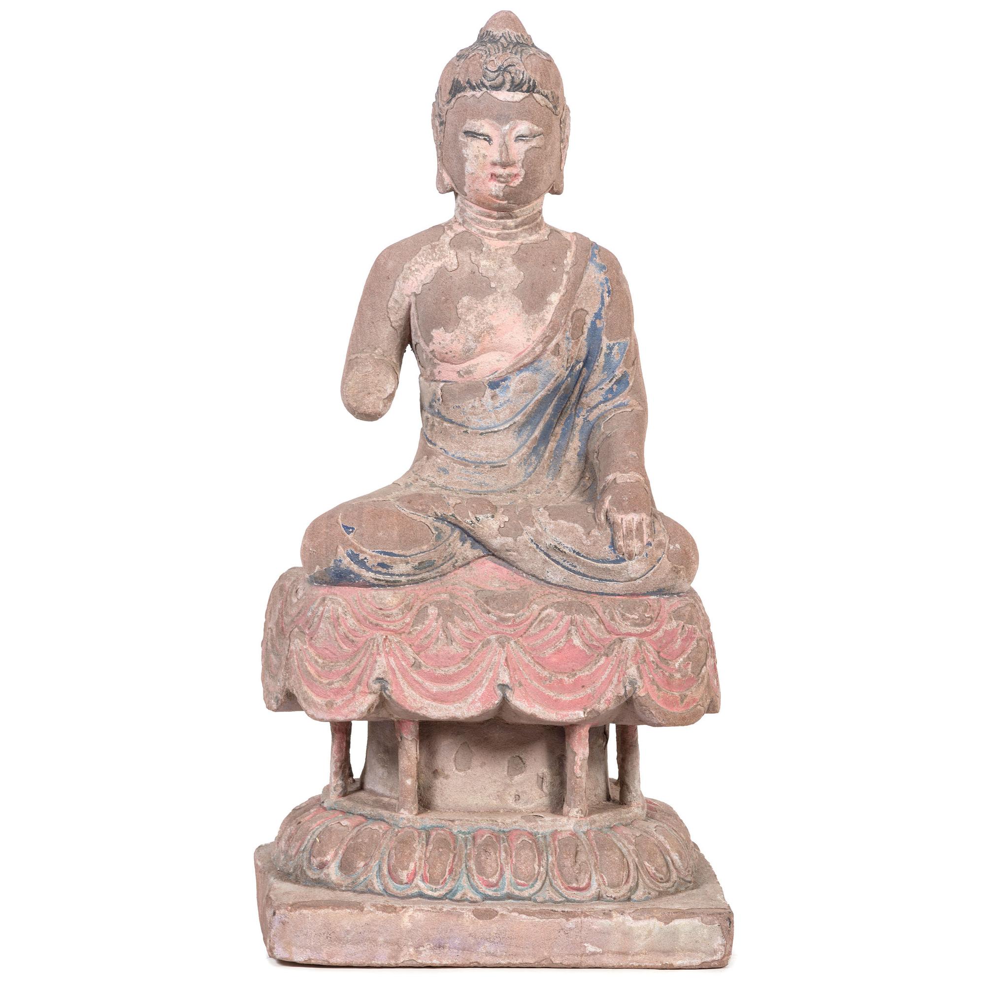 A Seated Stoned Buddha Figure on a Lotus Form Base