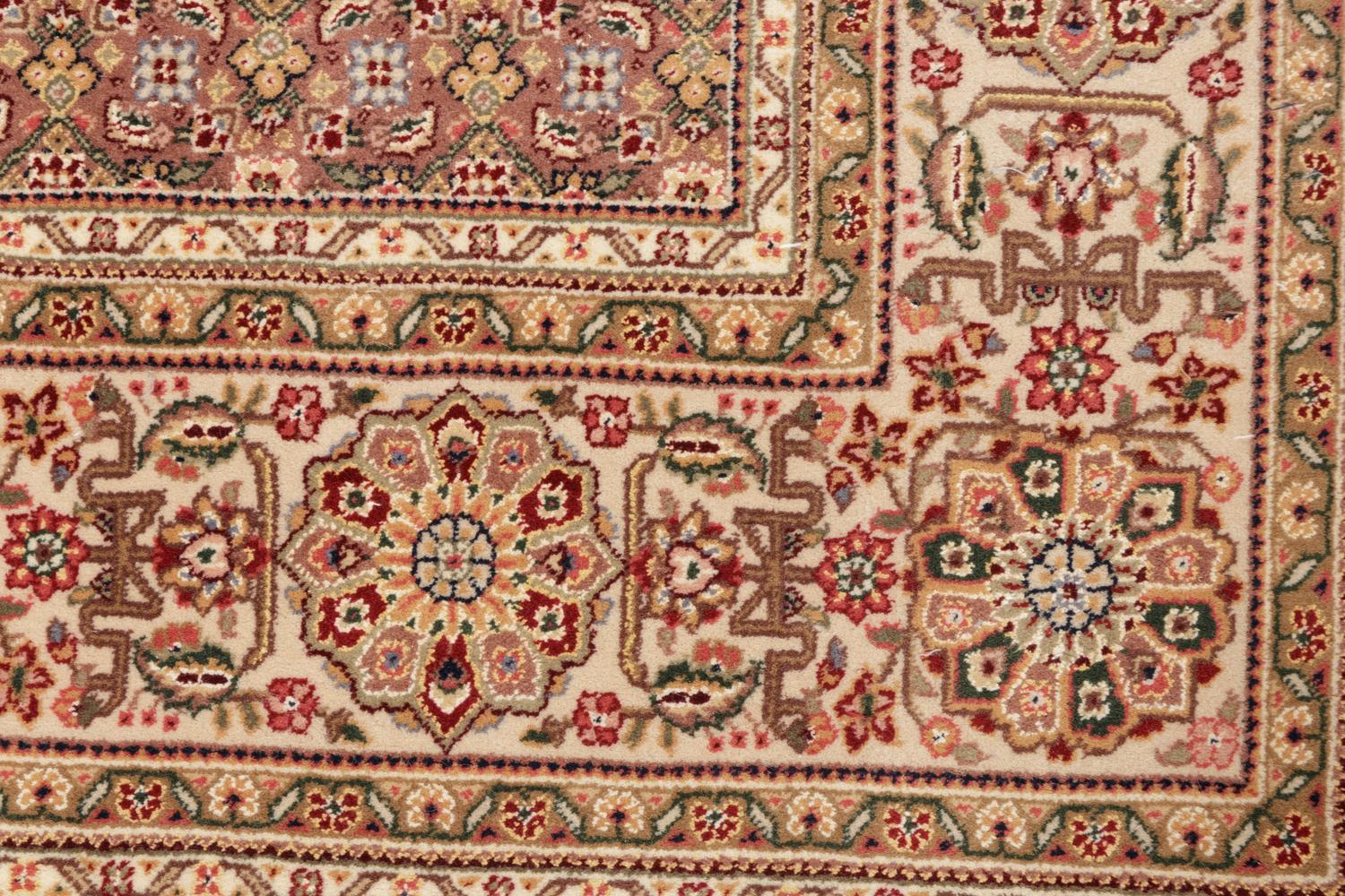 A Tabriz Wool Rug