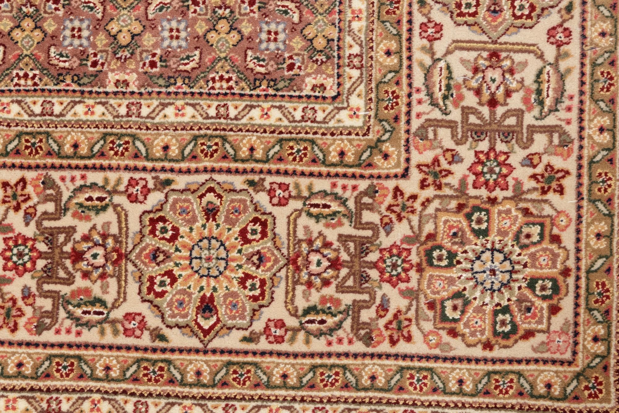 A Tabriz Wool Rug