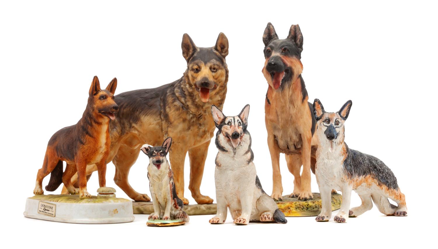 A Group of Six Porcelain and Ceramic German Shepherds Width of widest 9 1/2 inches.