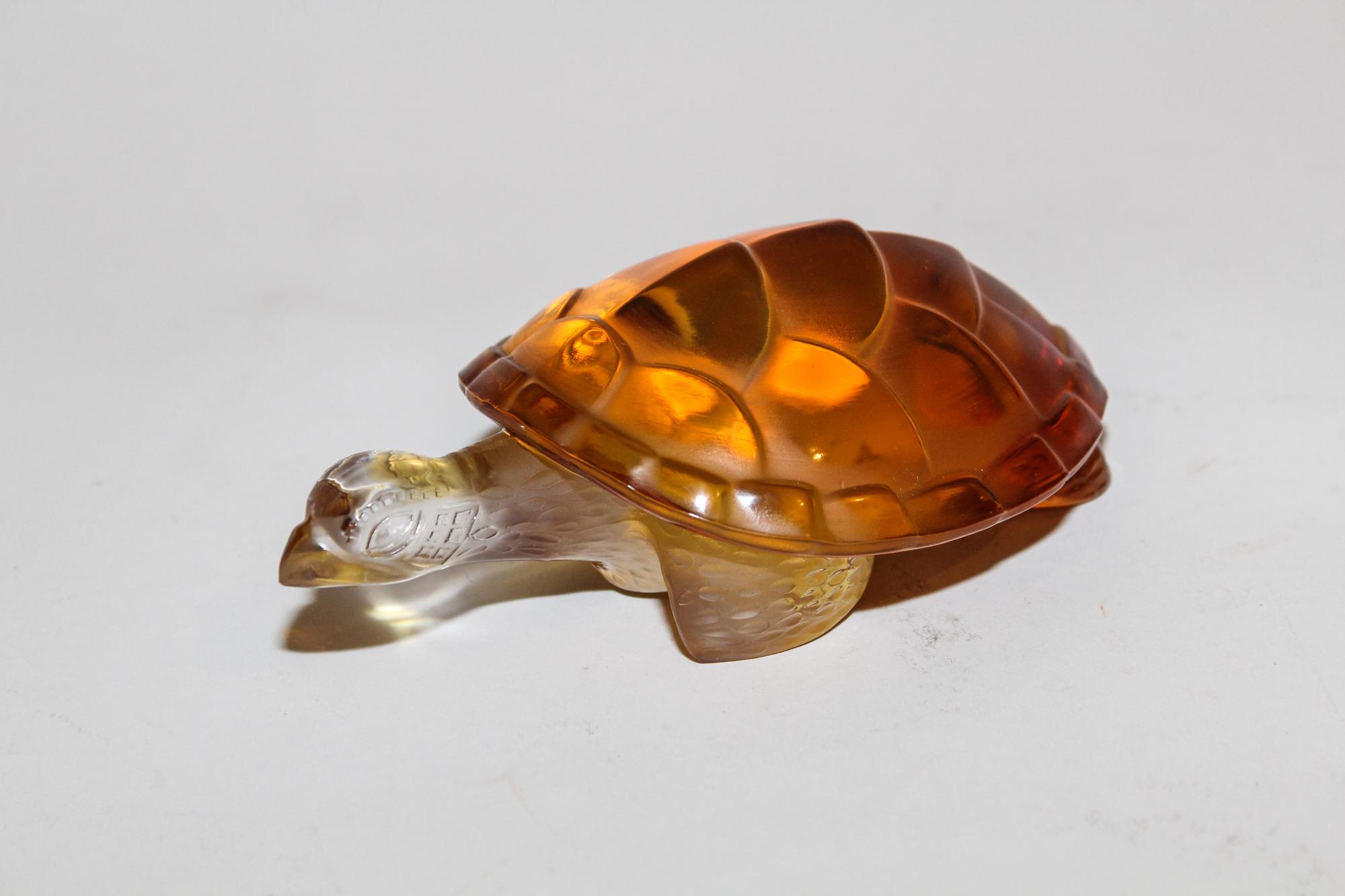 A Lalique Molded and Frosted Glass Figure Width 6 inches. — SECOND HALF 20TH CENTURY