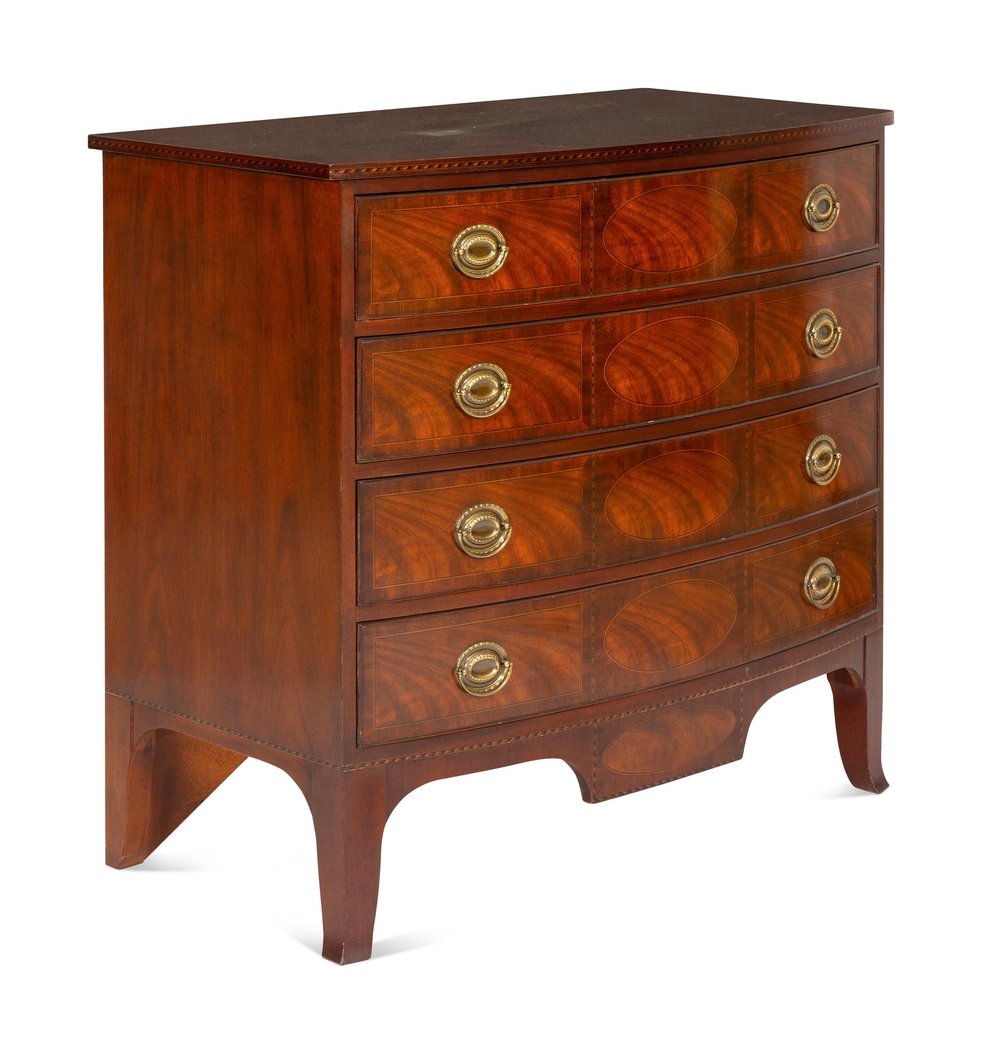 A Pair of Federal Style Mahogany Bow-Front Chests
