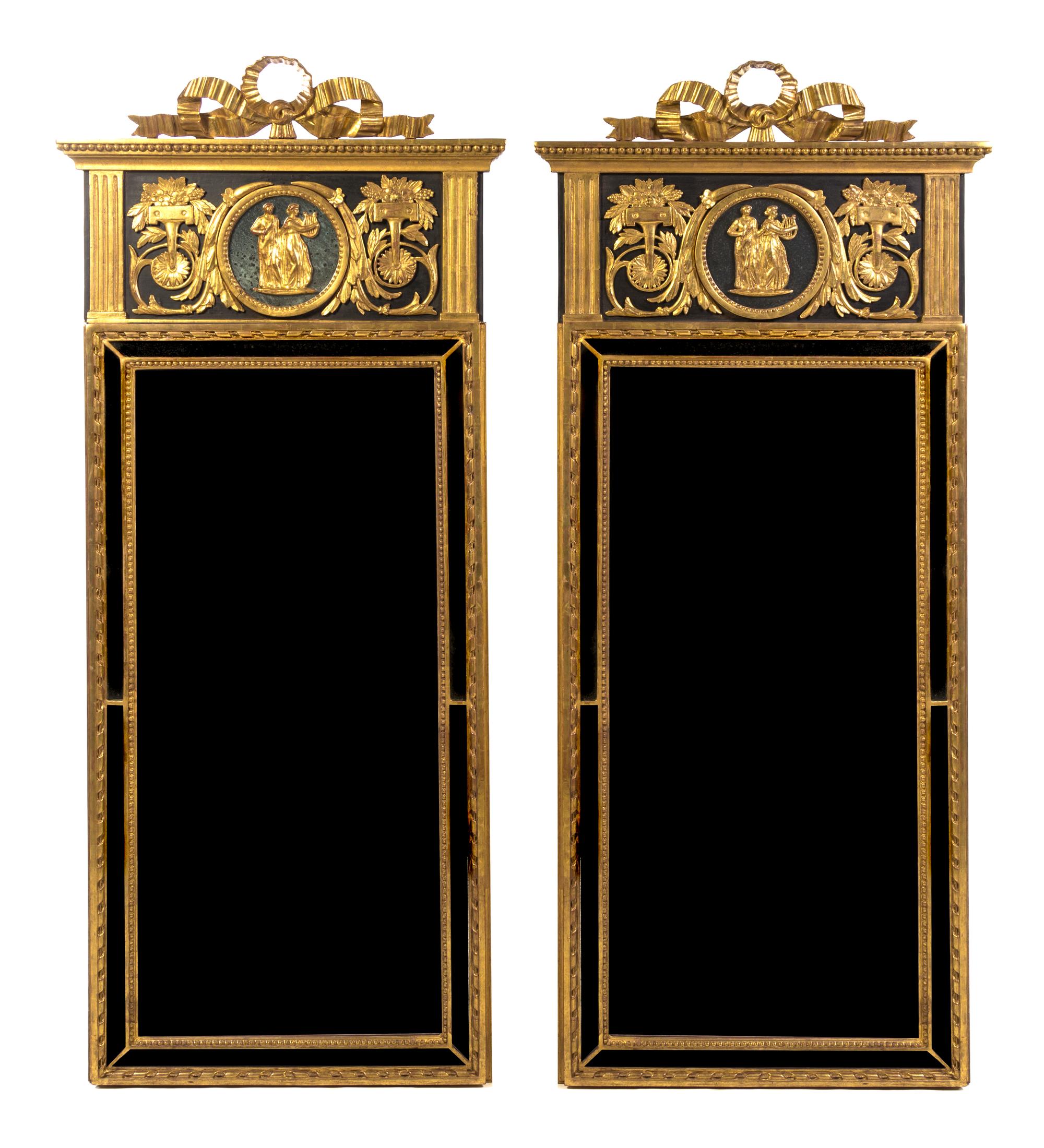 A Pair of Continental Neoclassical Giltwood Pier Mirrors, Height 68 x width 28 inches.