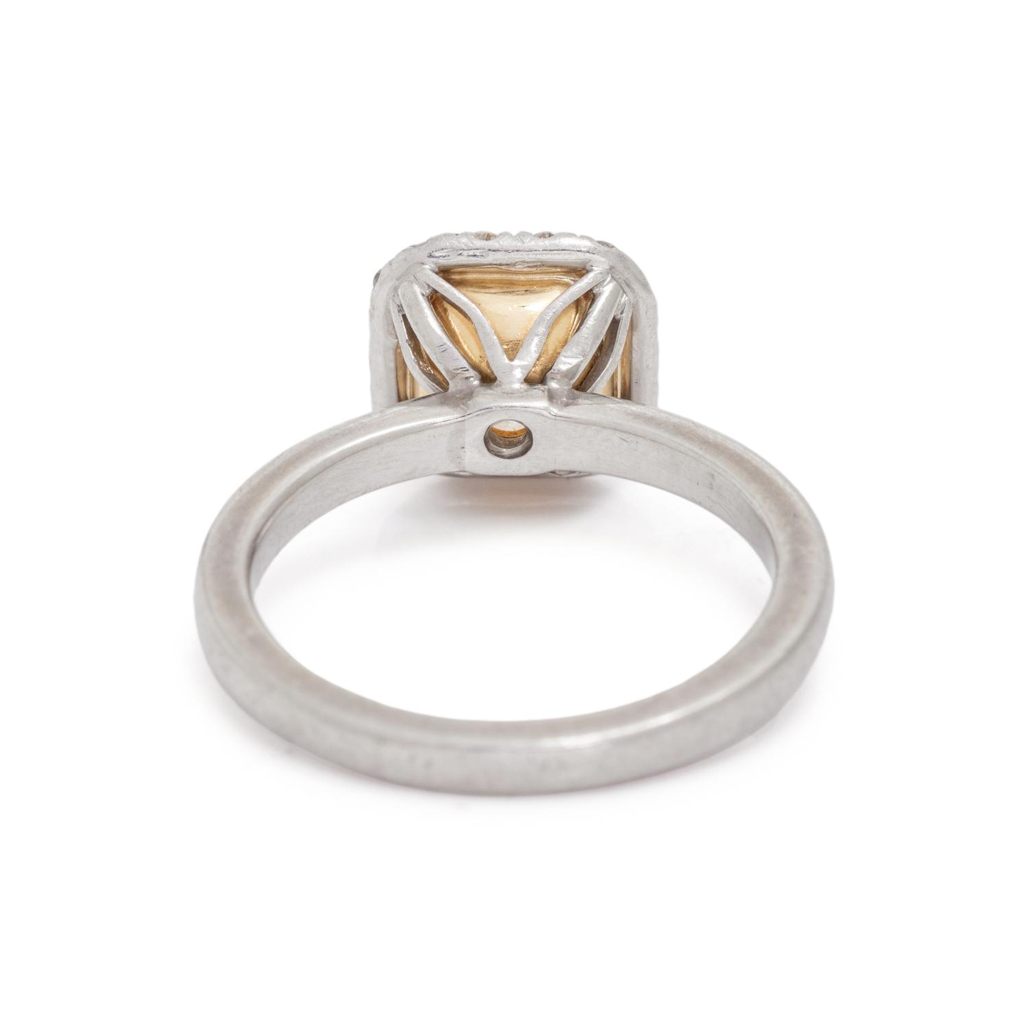 FANCY INTENSE YELLOW DIAMOND AND DIAMOND RING
