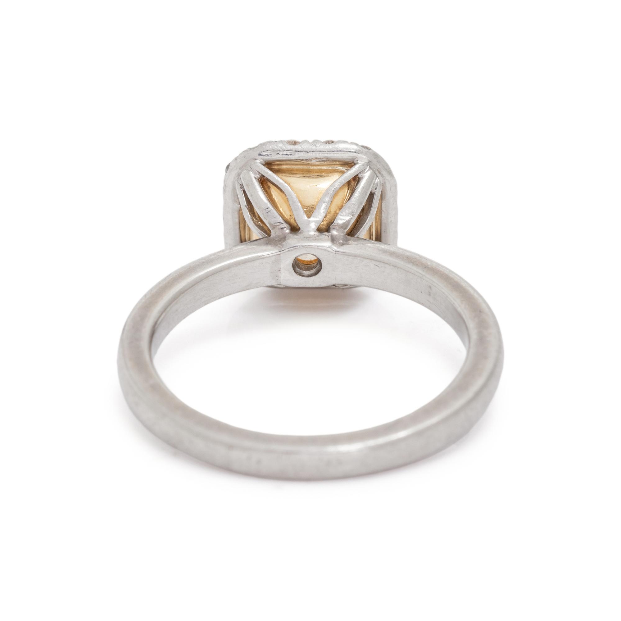 FANCY INTENSE YELLOW DIAMOND AND DIAMOND RING
