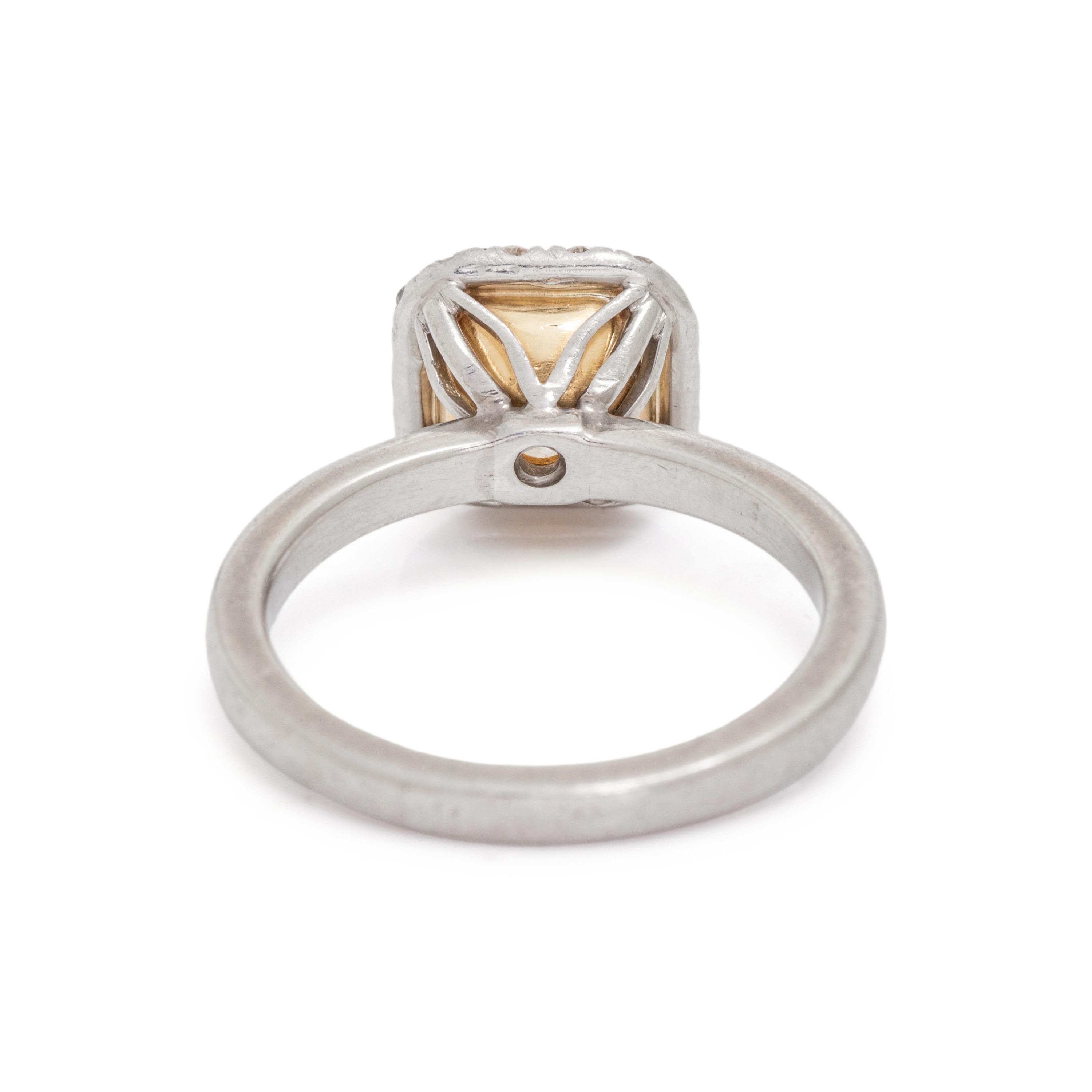 FANCY INTENSE YELLOW DIAMOND AND DIAMOND RING