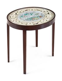A Glass and Porcelain Inset Cocktail Table