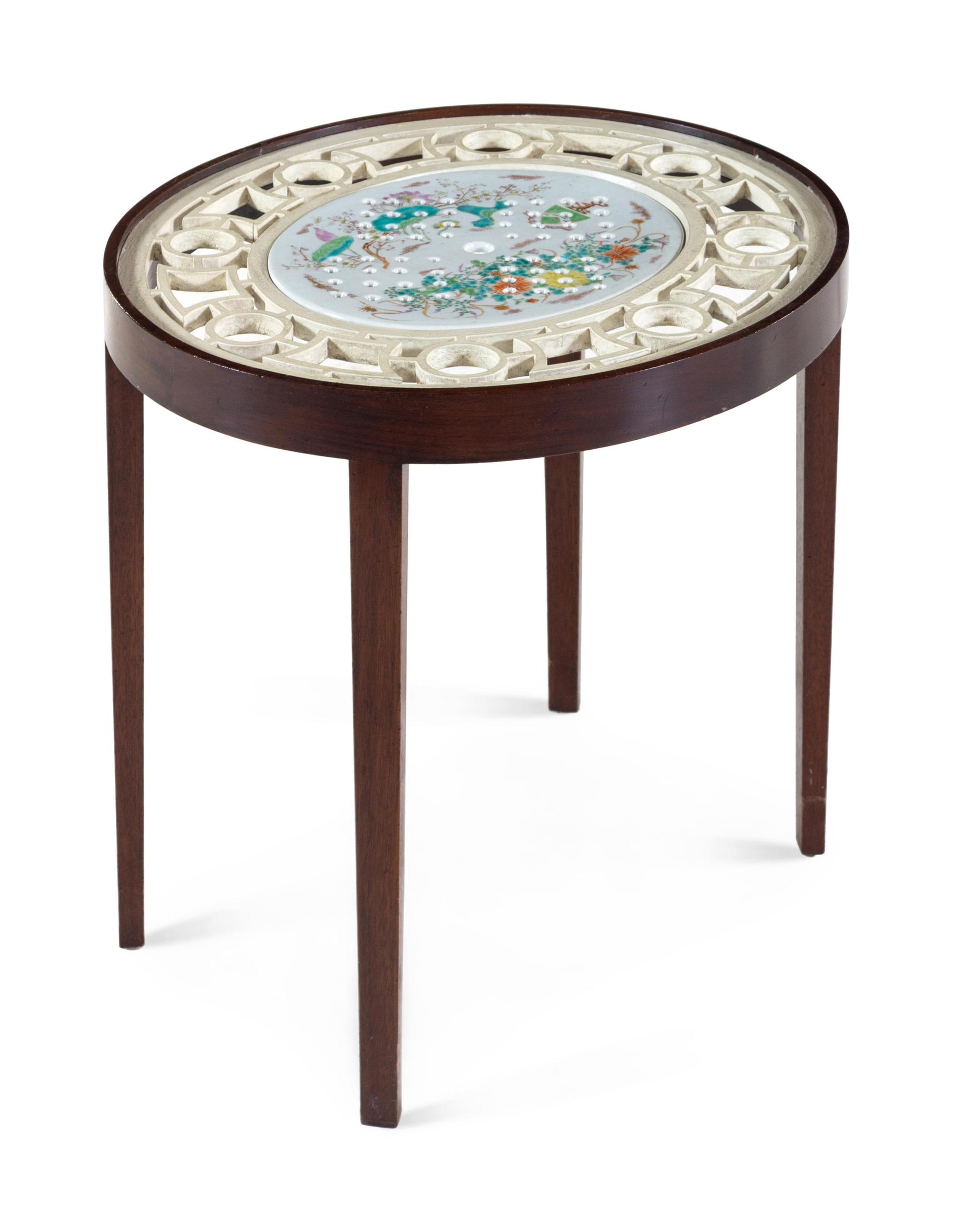 A Glass and Porcelain Inset Cocktail Table