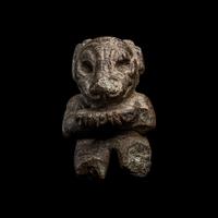 An Olmec Serpentine Kneeling Transformation Figure
