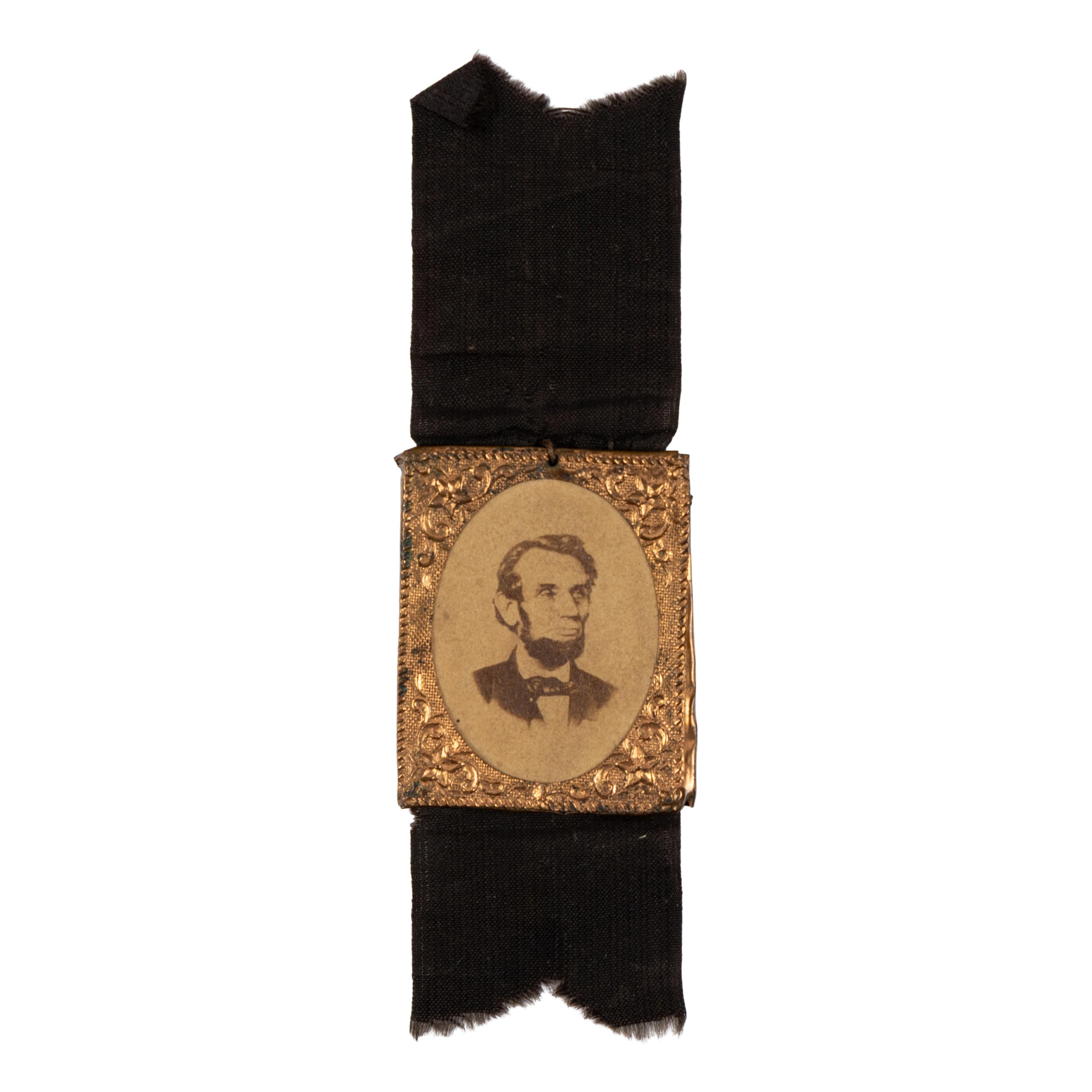 [LINCOLN FUNERAL]. A group of 4 mourning badges and 1 campaign badge, comprising: