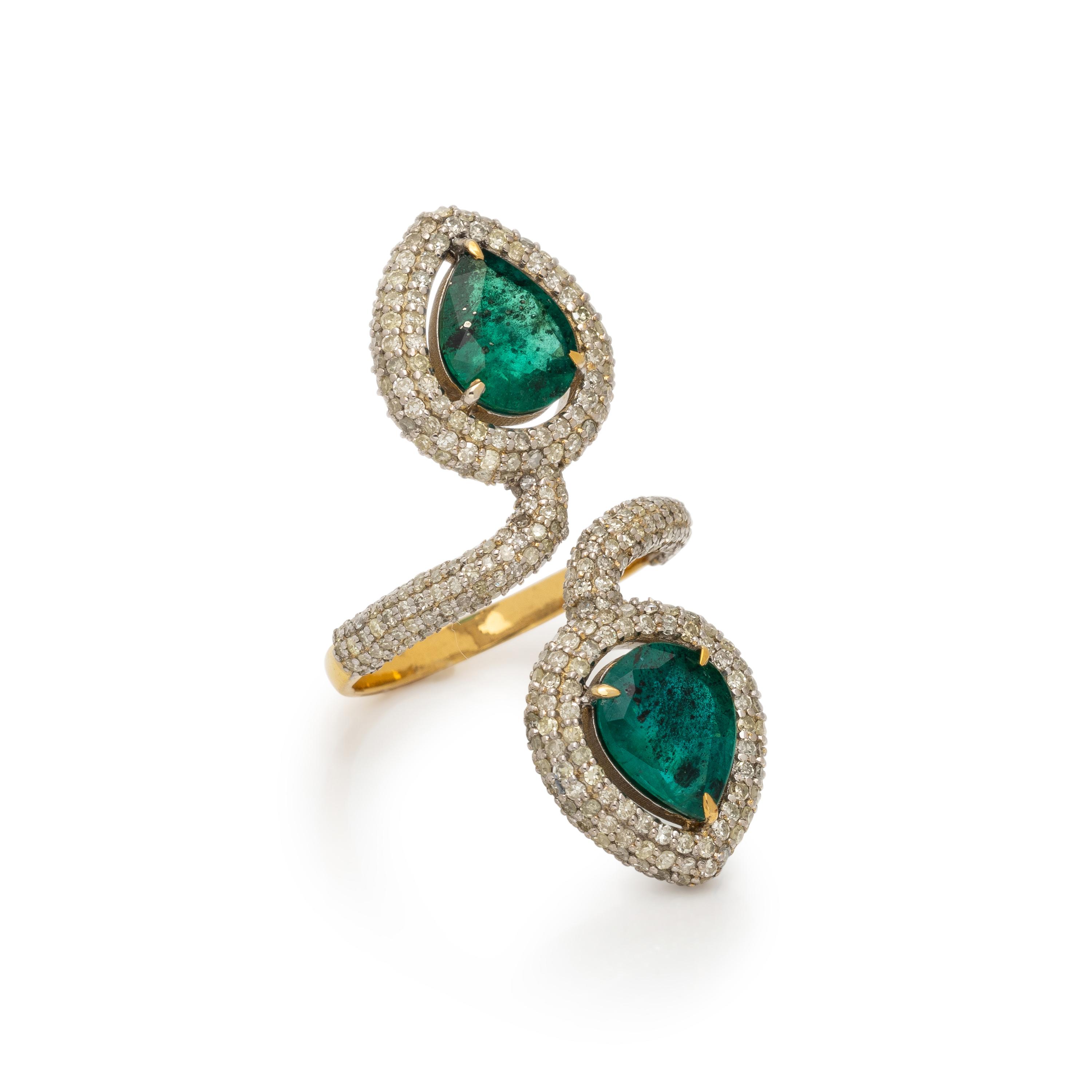 EMERALD AND DIAMOND BY-PASS RING