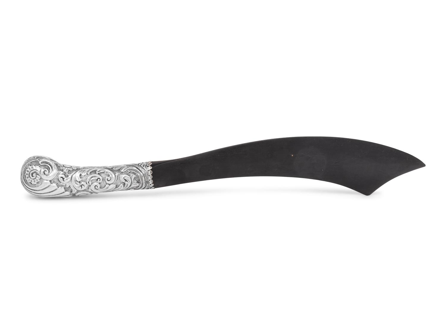 A Victorian Silver and Ebony Scimitar-Form Page Turner