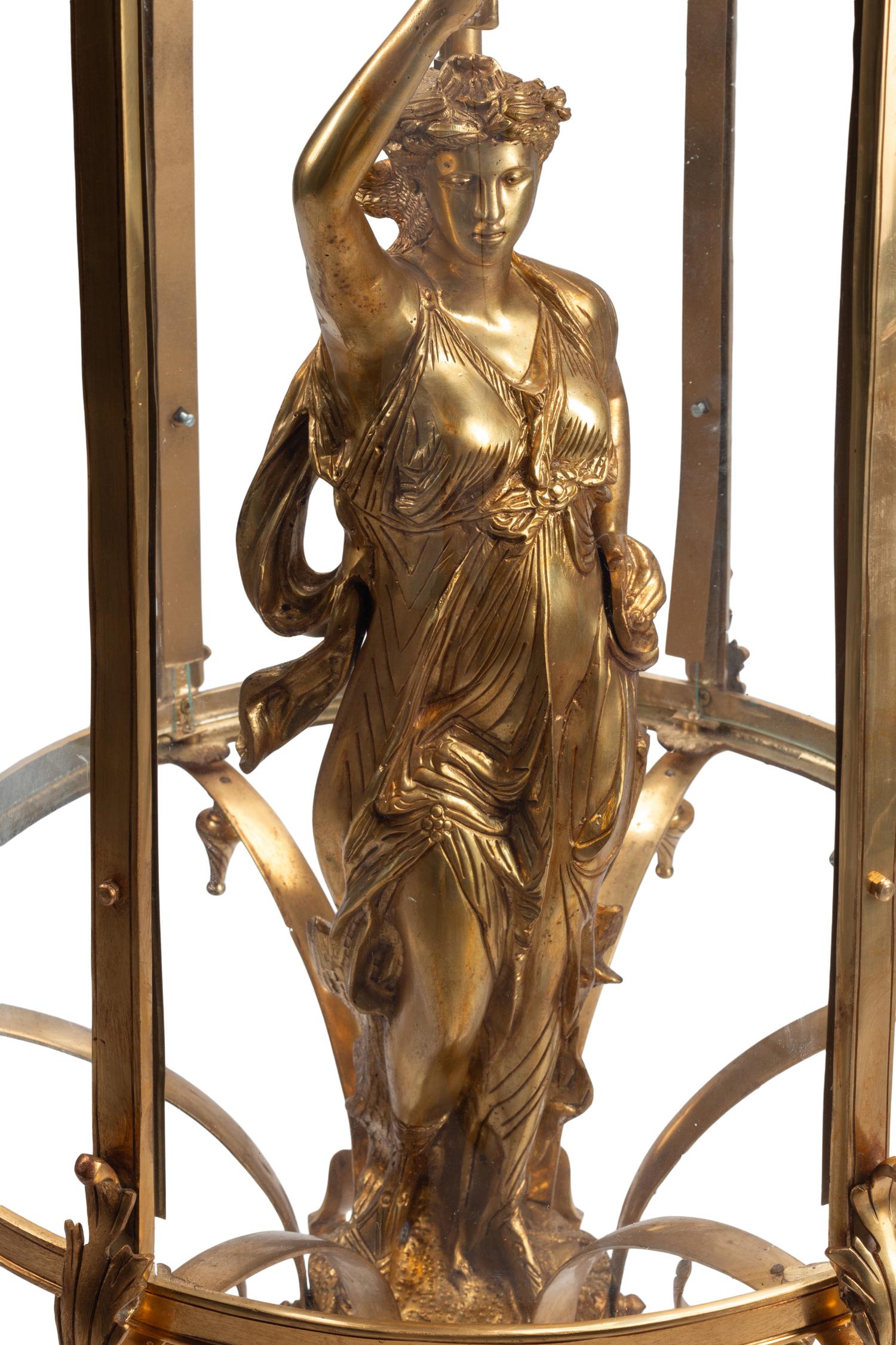 A Pair of Continental Gilt Bronze Figural Hall Lanterns