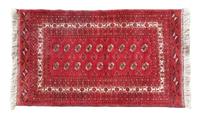 A Turkoman Wool Rug 6 feet x 3 feet 6 inches.