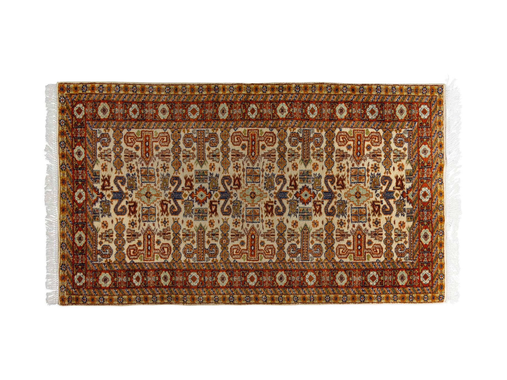 A Group of Three Wool Rugs