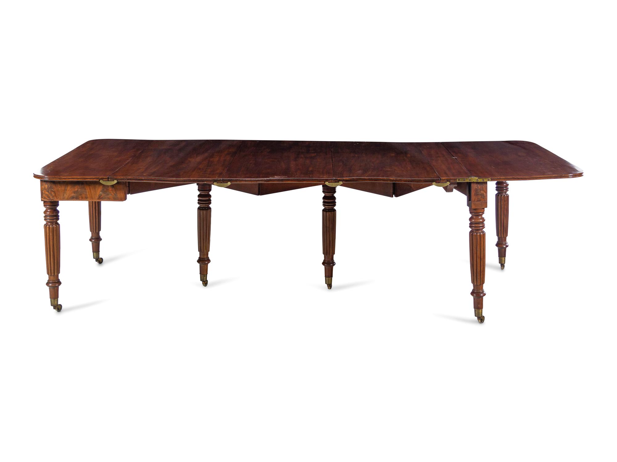 A Regency Mahogany Concertina-Action Extension Dining Table