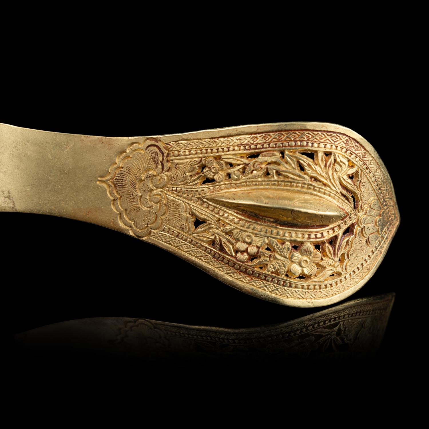 A Chinese Gold and Ruby Inset Ruyi -Shape Hair Ornament, Zan, Qing Dynasty 清 滇式嵌寶鏤空花卉紋如意金簪