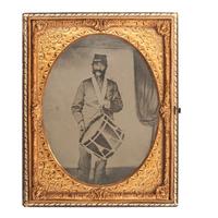 [MILITARIA]. Half plate ambrotype of drummer posed with his instrument.