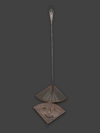 A Forged and Hammered Iron Figural Chestnut Roaster