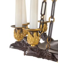A Restauration Gilt and Patinated Bronze Twelve-Light Chandelier