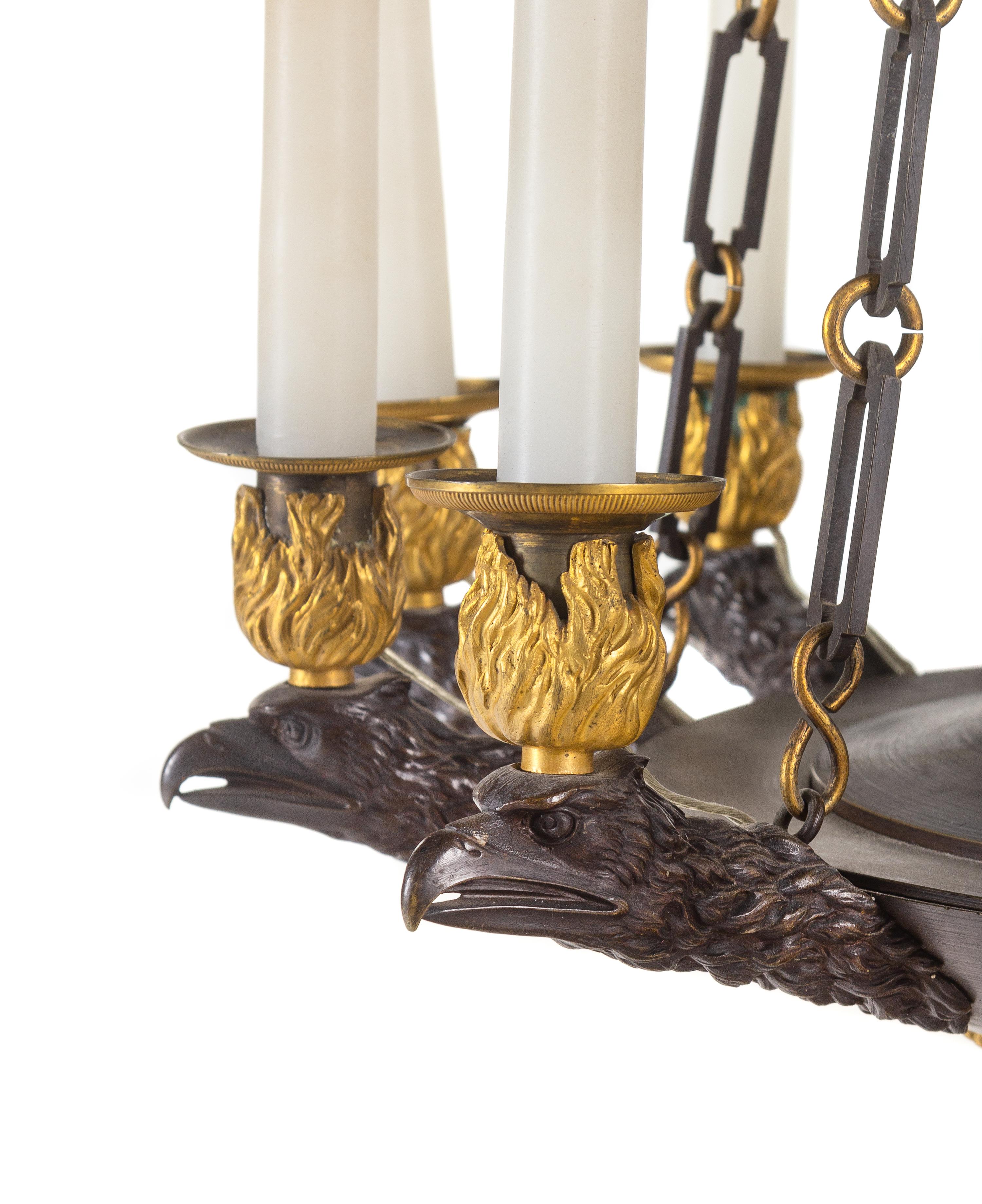A Restauration Gilt and Patinated Bronze Twelve-Light Chandelier