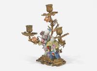 A gilt-bronze mounted Chinese figural porcelain three-light candelabra, the figure 18th century, the gilt bronze 19th century