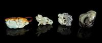 Four Chinese Carved Jade and Jadeite Toggles