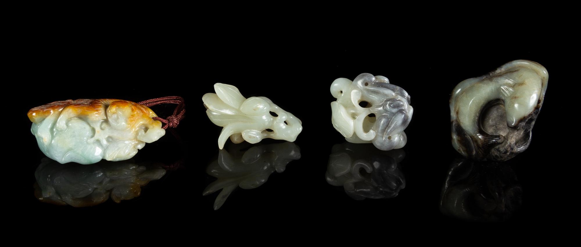Four Chinese Carved Jade and Jadeite Toggles