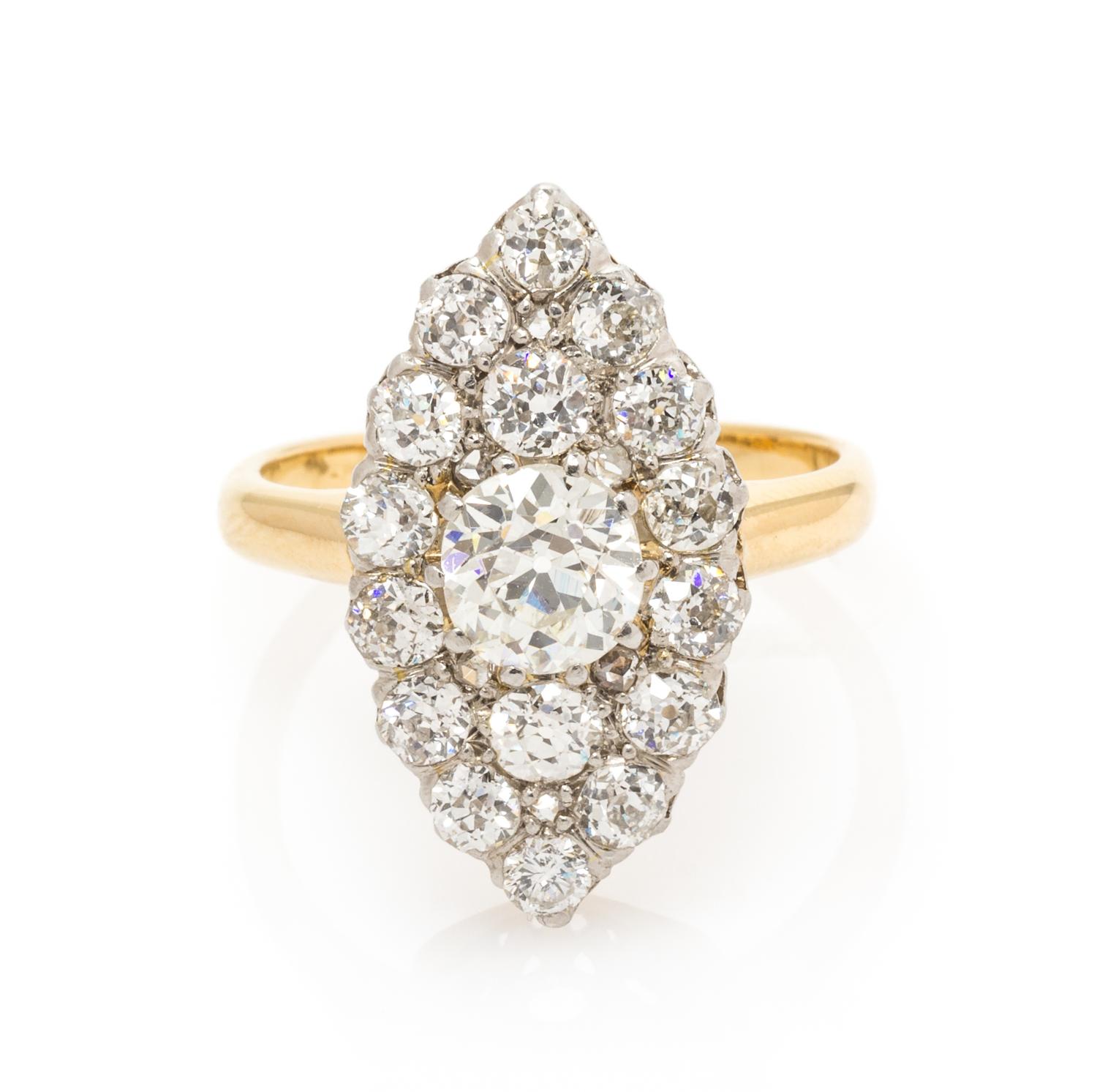 An Edwardian Platinum Topped Yellow Gold and Diamond Ring, 5.05 dwts.