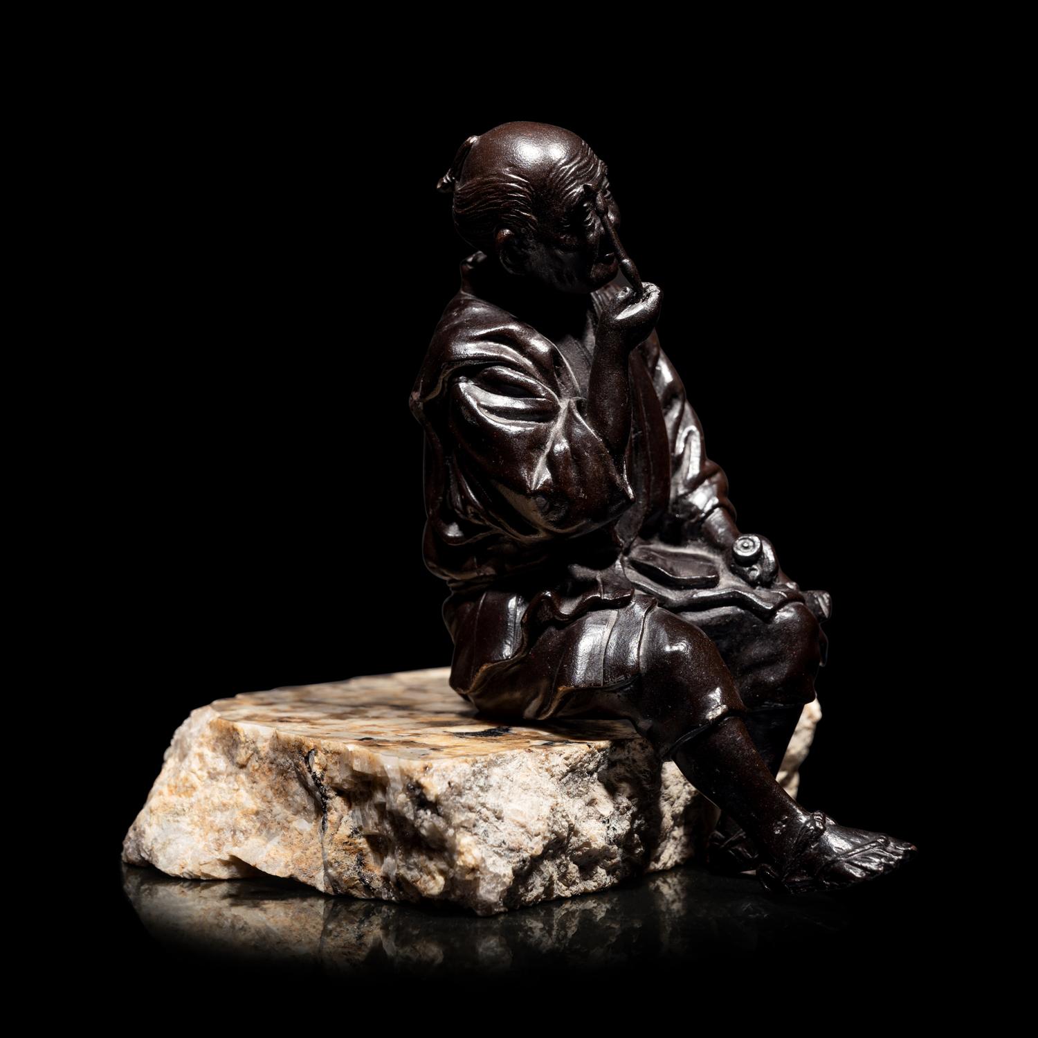 A Bronze Okimono of an Elderly Man
