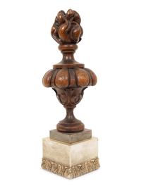 A Carved Oak Flaming Urn Finial Mounted on a Pedestal Base