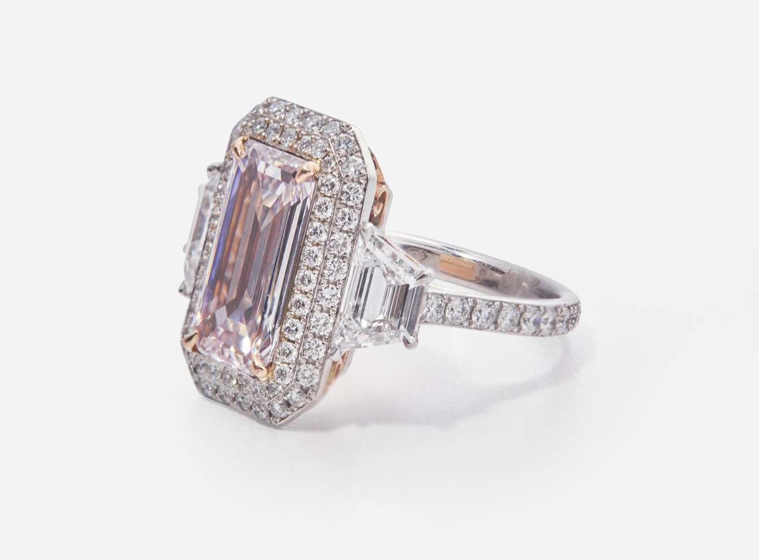 A Platinum, Rose Gold, Pink Diamond, and Diamond Ring