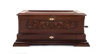 A Peerless Forte-Piccolo Mahogany Cylinder Music Box, Height 10 1/8 x width 25 1/4 x depth 14 1/4 inches.