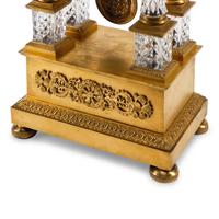 A Charles X Gilt Bronze and Cut Glass Mantel Clock