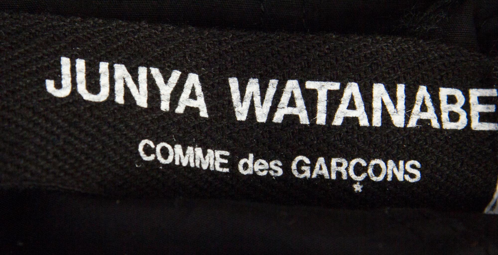 A Junya Wantanabe Black Cotton Parachute Ensemble, Jacket size S, pant size M.