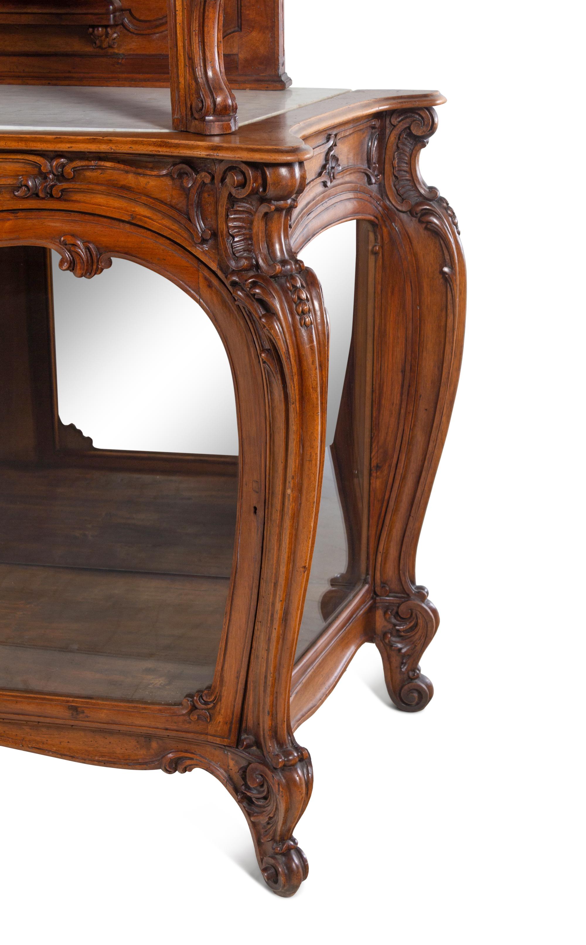 A Louis XV Style Carved Walnut Buffet à Deux Corps
