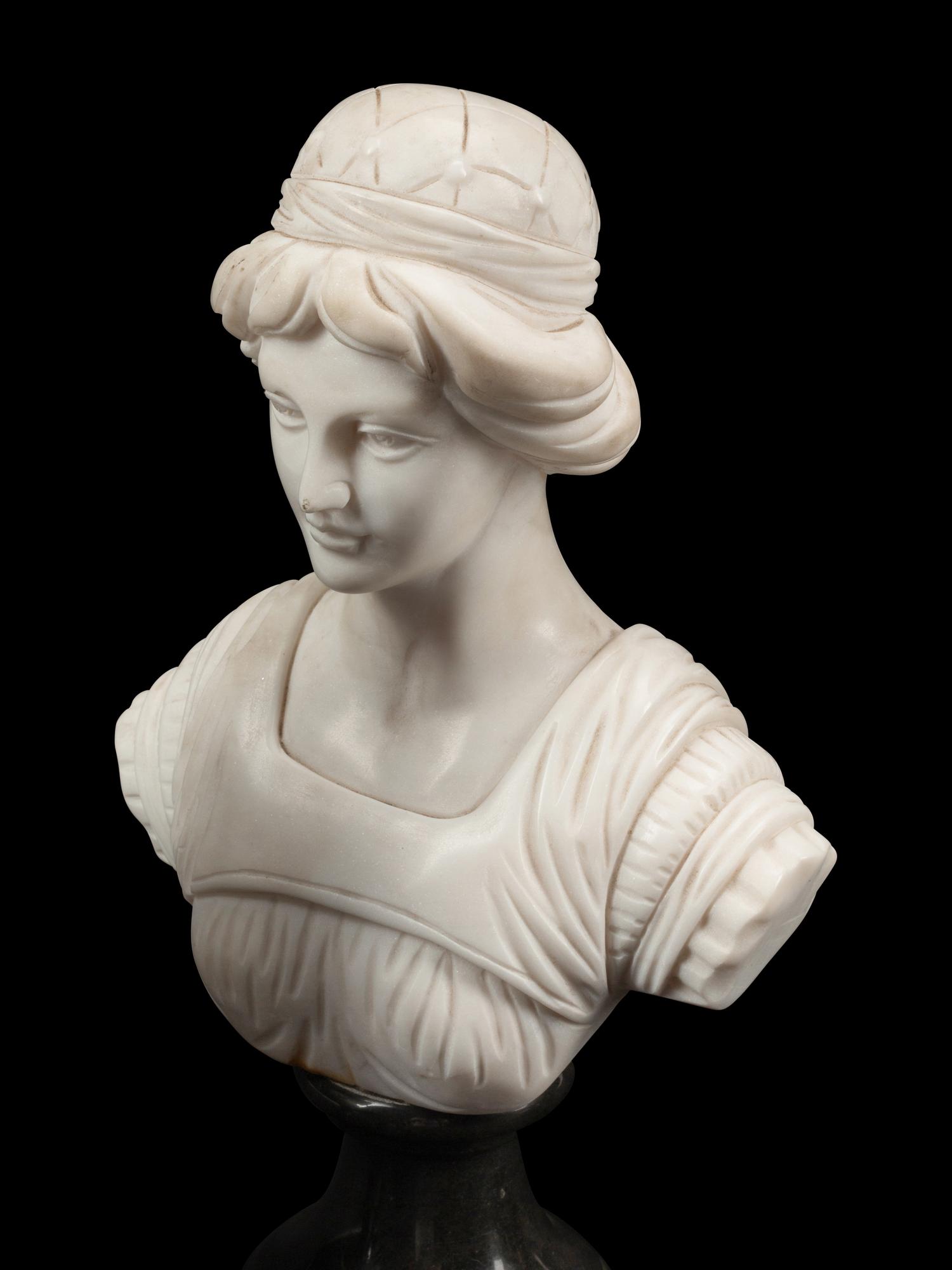 A Set of Four Bi-Color Marble Busts