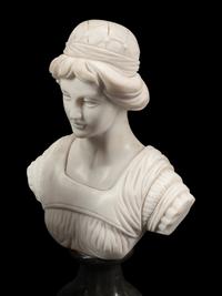 A Set of Four Bi-Color Marble Busts